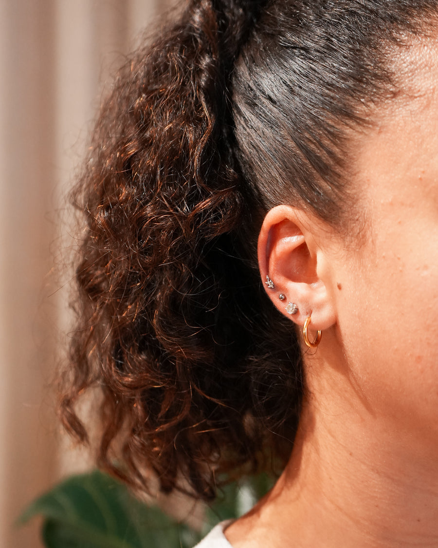 Fine piercing jewellery worn at SHY